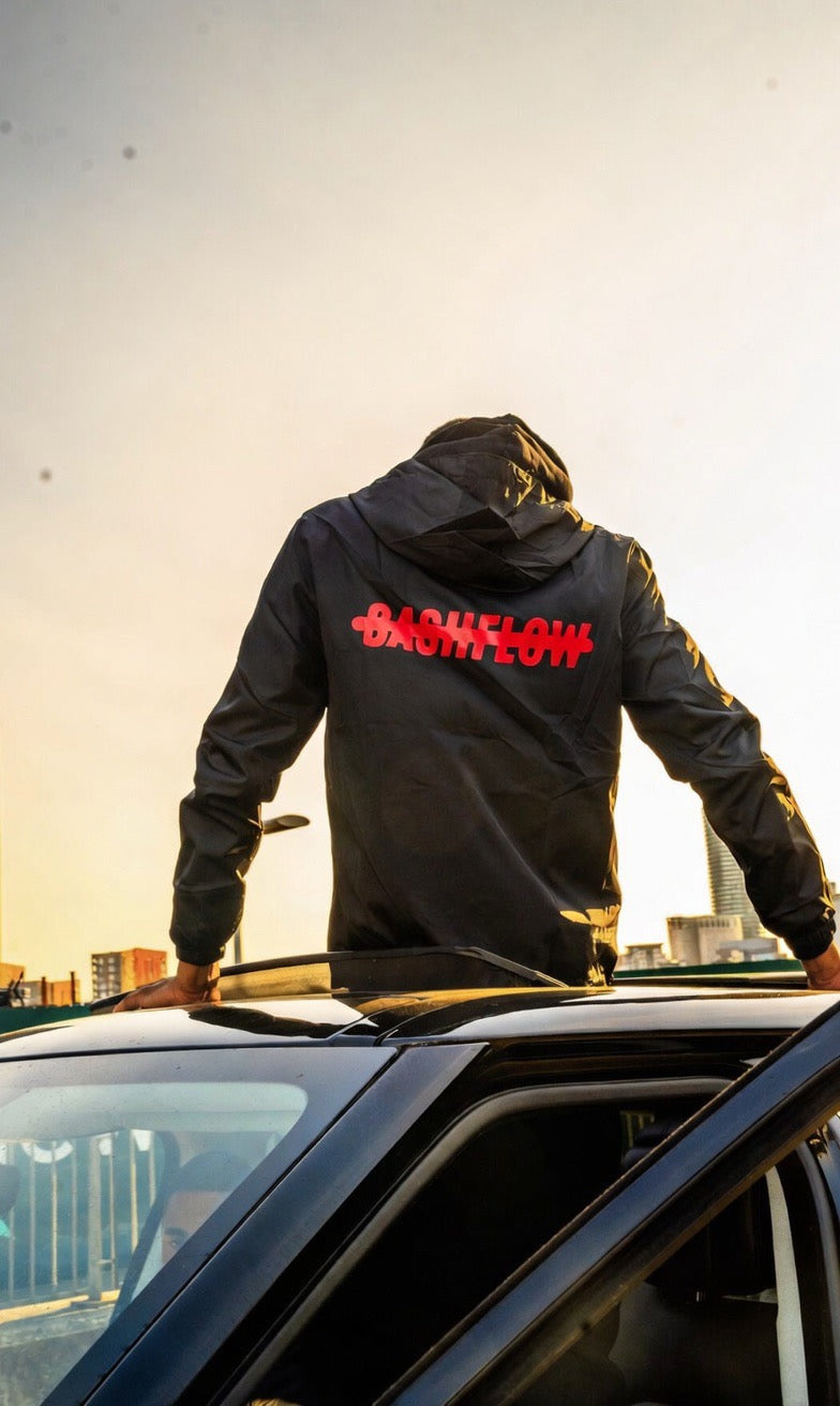 Fire red cash flow windbreaker