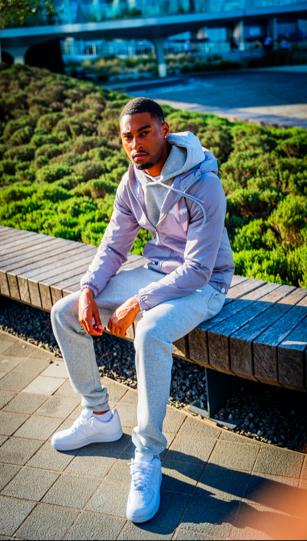 Grey cash flow windbreaker